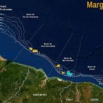 Caixa de vídeo com o mapa do estado do Maranhão destacando os blocos de petróleo operados pela Petrobras na Margem Equatorial, incluindo áreas de águas profundas e baías, essenciais para economia e direito marítimo.